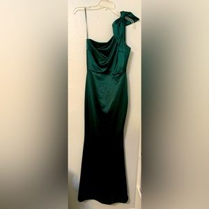 One shoulder, bow on left shoulder, emerald green satin dress.